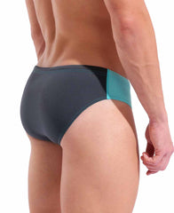 Arena men's team swim solid brief in water/asphalt color, featuring a snug fit and classic design for competitive swimming.
