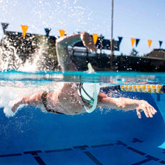 Finis Stability Snorkel in sage green, featuring a streamlined design for comfortable breathing during swim training.