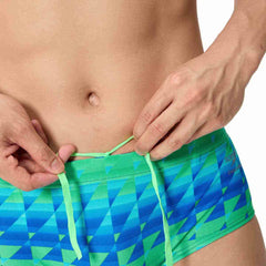 Speedo men's printed 13.5cm brief with quilt triangle pattern in blue and green, designed for comfortable swimwear.