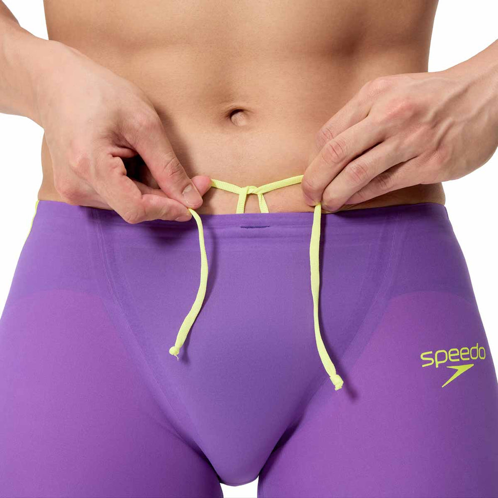 Speedo men's Fastskin LZR Pure Intent 2.0 jammer in grape, blue, and yellow with a sleek, streamlined design for competitive swimming.