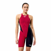 Speedo Women's Fastskin LZR HyperPro kneesuit in regal red and black, made for competitive swimming.