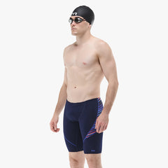 TYR men's Zollner Curve Splice jammer in navy, red, and blue, featuring a sleek swim jammer design with colorful splice details.