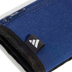 Close-up of Adidas Linear Wallet in navy and white showing the textured fabric and sleek design, ideal for everyday use.