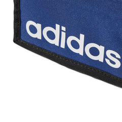 Close-up of Adidas Linear Wallet in navy and white showing the textured fabric and sleek design with brand logo details.