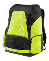 Yellow TYR Alliance 45L backpack with multiple compartments, adjustable straps, and a sleek design for sports and travel.