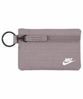 Nike Club Pouch Wallet in Light Violet Ore, black, and white with a sleek design and Nike logo, perfect for everyday use.