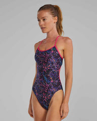 TYR Women's Stipple Trinityfit Swimsuit in Petunia, showing vibrant pink swimsuit with sleek fit and stylish design.