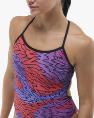 TYR Women's Hodori Trinityfit swimsuit in orange and purple, featuring a sleek design and supportive fit for swimming.