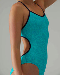 TYR Women's Trinityfit lapped swimsuit in teal, featuring a sleek design and supportive fit for competitive swimming.