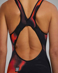 TYR Womens Venzo Infrared Openback Kneeskin in fire color, sleek swim kneesuit with open back design for competitive swimming.