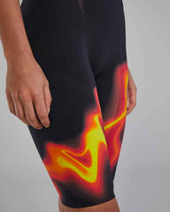 TYR Womens Venzo Infrared Openback Kneeskin in fire color, close-up showing sleek design and open back style for competitive swimming.