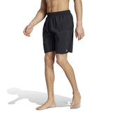 Black and Lucid Lemon Adidas men's solid CLX classic-length swim shorts with an elastic waistband, shown on a white background.