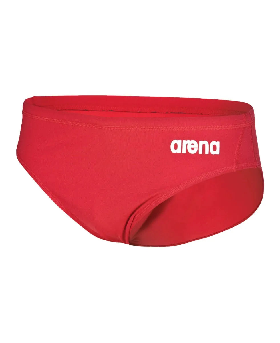 Arena men's team swim solid briefs showing blue fabric, elastic waistband, and snug fit, designed for competitive swimming.