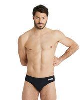 Black Arena men's swim briefs with a solid design, suitable for competitive and recreational swimming.