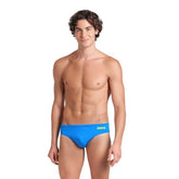 Arena men's team swim briefs in Blue River and Arctic Lime with a solid design, featuring a snug fit for competitive swimming.