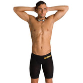 Black Arena Men's Carbon Air2 jammer swimming suit, close-up view of the sleek, fitted swimwear for competitive swimming.
