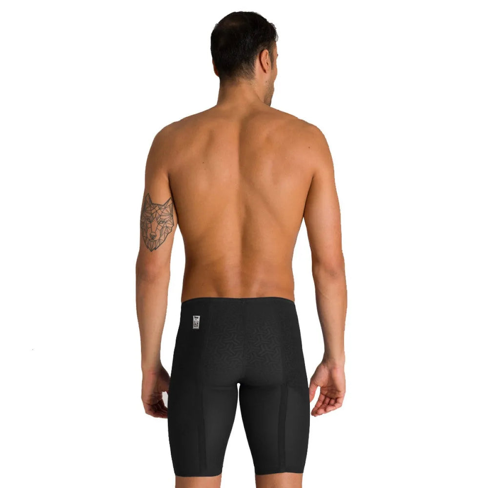 Black Arena men's Carbon Glide jammer swimsuit for competitive swimming, featuring sleek, streamlined design and durable fabric.