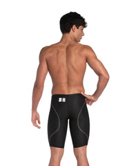 Arena men's Powerskin ST Next Jammer in black, close-up view showcasing the sleek, form-fitting swim jammer for competitive swimming
