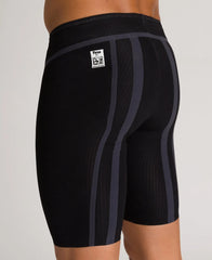Black Arena Mens Carbon Core FX Jammer swimwear, close-up view showing sleek fabric and elastic waistband for competitive swimming.