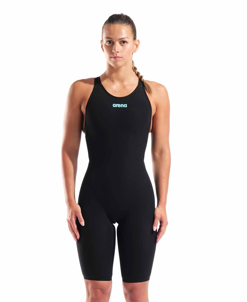 Arena Womens Powerskin Veloce open-back kneesuit in black and teal, designed for competitive swimming with sleek, hydrodynamic fit.