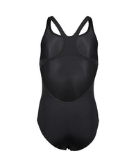 Black Arena Girls Team Swim Pro solid swimsuit displayed on a girl in a pool setting, highlighting sporty design and comfortable fit.