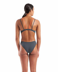 Arena women's solid tech back swimsuit in asphalt and bright coral, featuring a sleek design and supportive fit.
