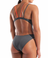 Arena women's solid tech back swimsuit in asphalt and bright coral, featuring sleek design and supportive fit.