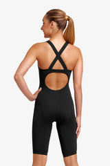 Funkita girls’ black still Fast Legs one-piece kneesuit, close-up of sleek black swimwear with stretchy fabric and high leg design.
