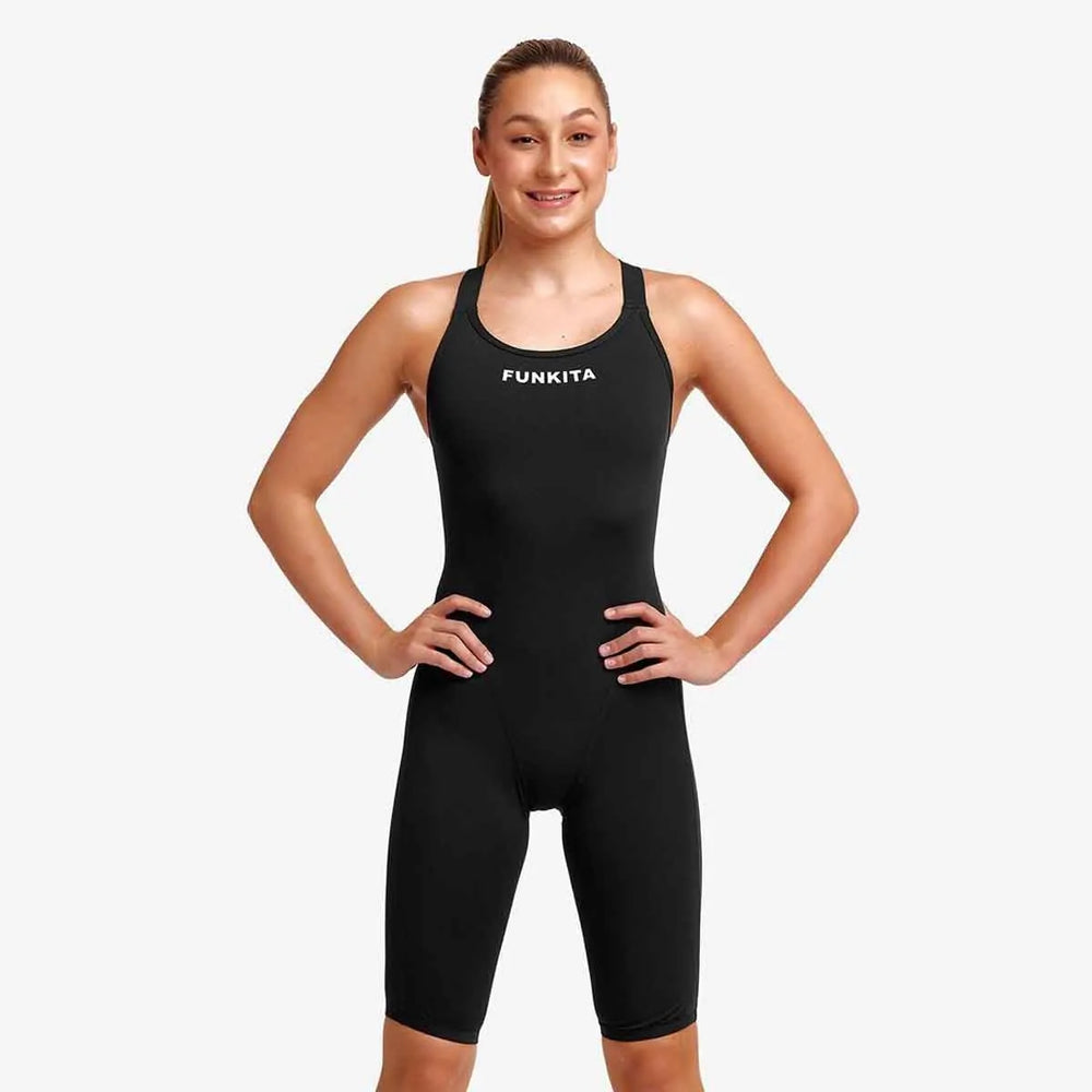 Funkita Girls Still Black Fast Secure One Piece swimsuit, black kneesuit with a sleek design for young swimmers.