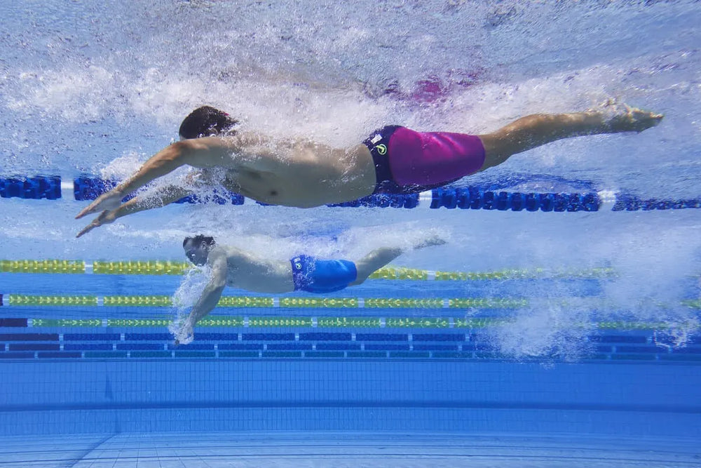 Funky Trunks men's Tidal Blast Apex Viper jammer swimwear in navy and pink with a vibrant, sleek design for competitive swimming.