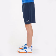 Joma Boys Nobel Shorts in dark navy, lightweight athletic shorts with an elastic waistband, designed for active wear.