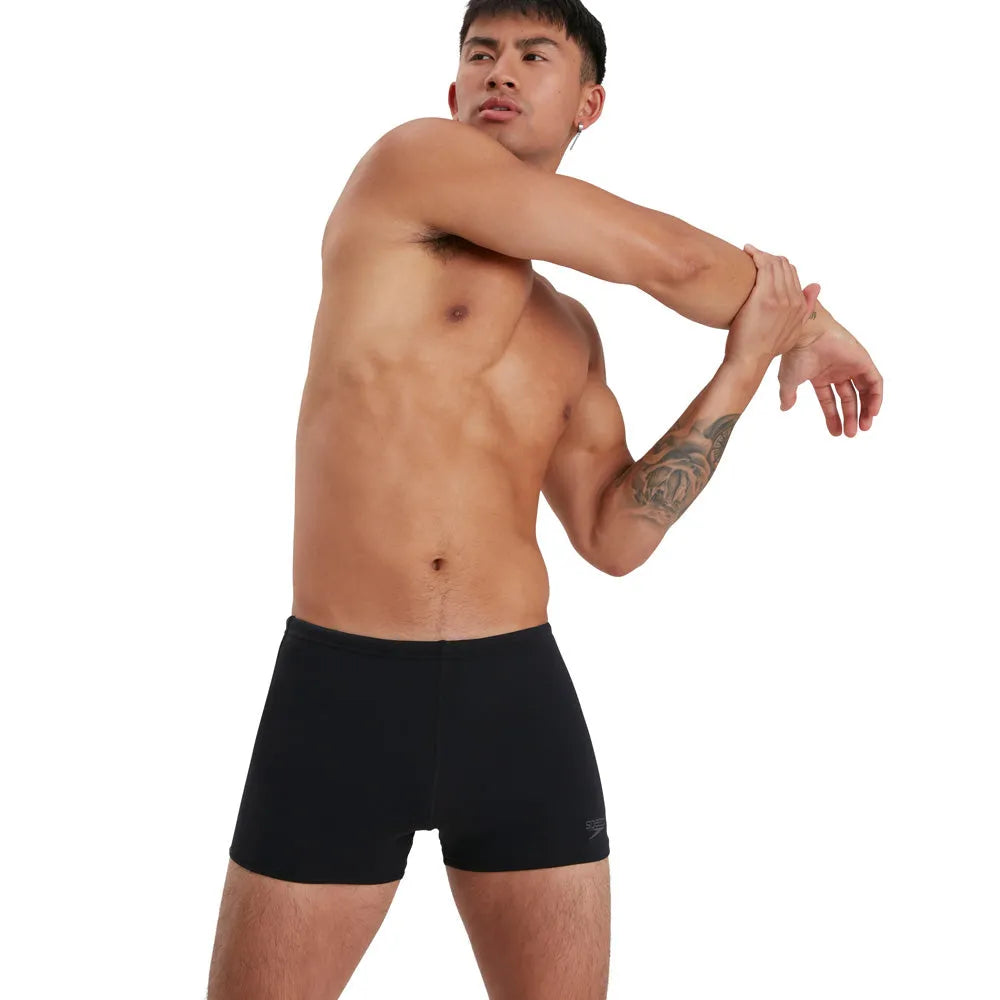 Black Speedo men's Eco Endurance+ aquashorts, close-up image showing durable swimwear fabric and sleek fit.