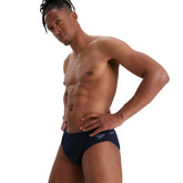 Speedo men's Eco Endurance+ 7cm swimsuit briefs, close-up showing blue fabric and elastic waistband.