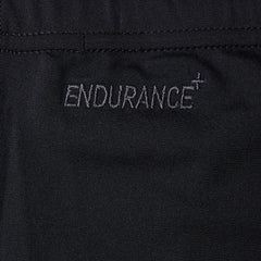 Speedo men's Eco Endurance+ jammer swimwear, close-up view showing black fabric with Speedo logo for competitive swimming