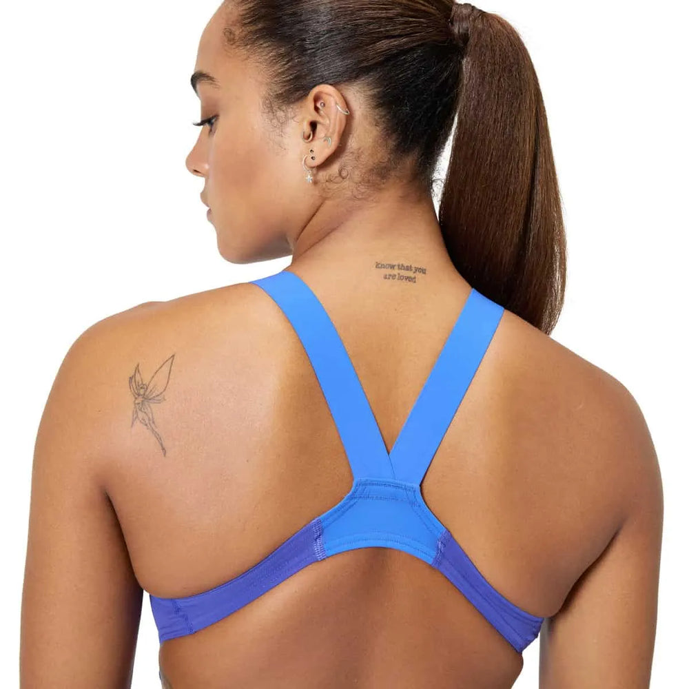 Speedo Women's Fastskin LZR Ignite Kneeskin in purple, close-up showcasing the sleek, performance-enhancing swimwear design.