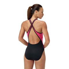 Black and raspberry Speedo women's high neck cross back swimsuit with splice design, suitable for swimming and water activities.