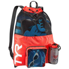 Red TYR Big Mesh Mummy Backpack, a large mesh bag with adjustable straps and spacious interior for swimming gear storage.