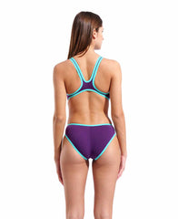 Arena women's one-piece swimsuit in plum and water colors with bold logo design, suitable for swimming and aquatic activities.