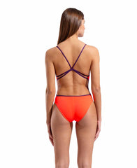 Arena women's lace back solid swimsuit in bright coral and plum, featuring a stylish design and comfortable fit.