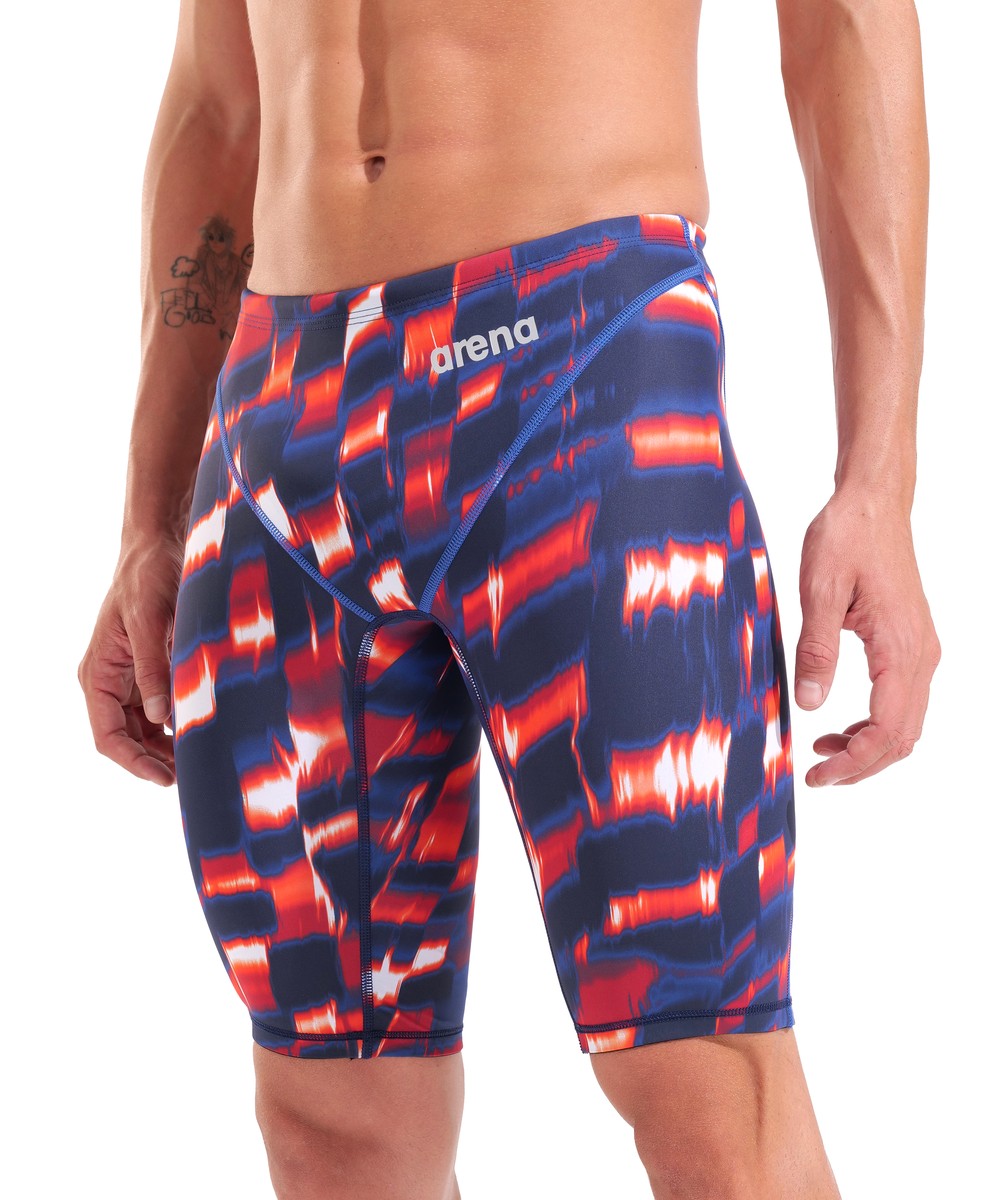 Arena men's Powerskin ST Next Aqua Gleam limited edition jammer in red, white, and blue, with sleek swimwear design visible.