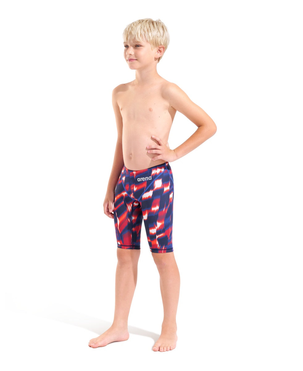 Arena Boys Powerskin ST Next Aqua Gleam limited edition jammers in red, white, and blue, designed for competitive swimming.