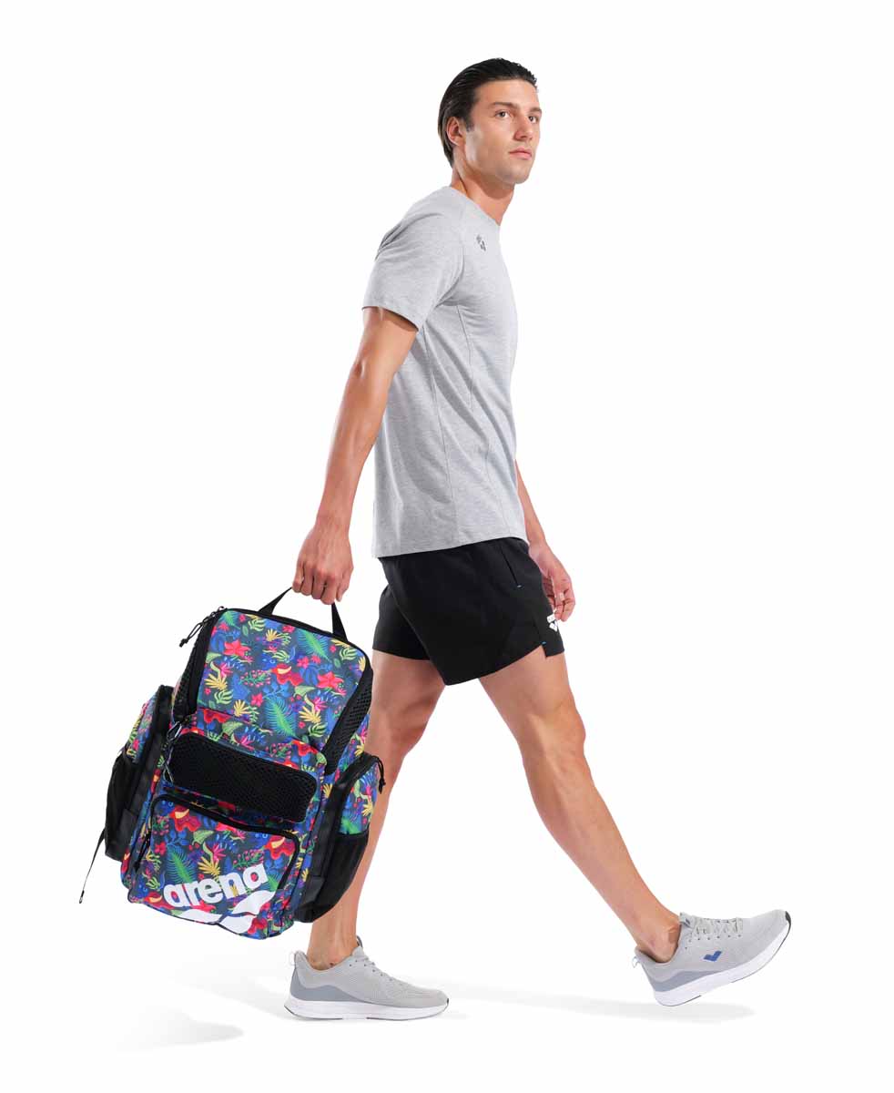 Arena One Go Allover Backpack 45L, black with colorful geometric patterns, showing multiple zippered compartments and padded shoulder straps.