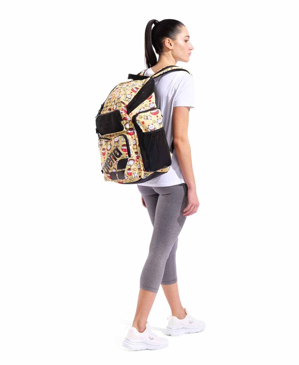 Arena One Go Allover Backpack 45L in Neko design, black and colorful pattern, with multiple compartments and adjustable straps.