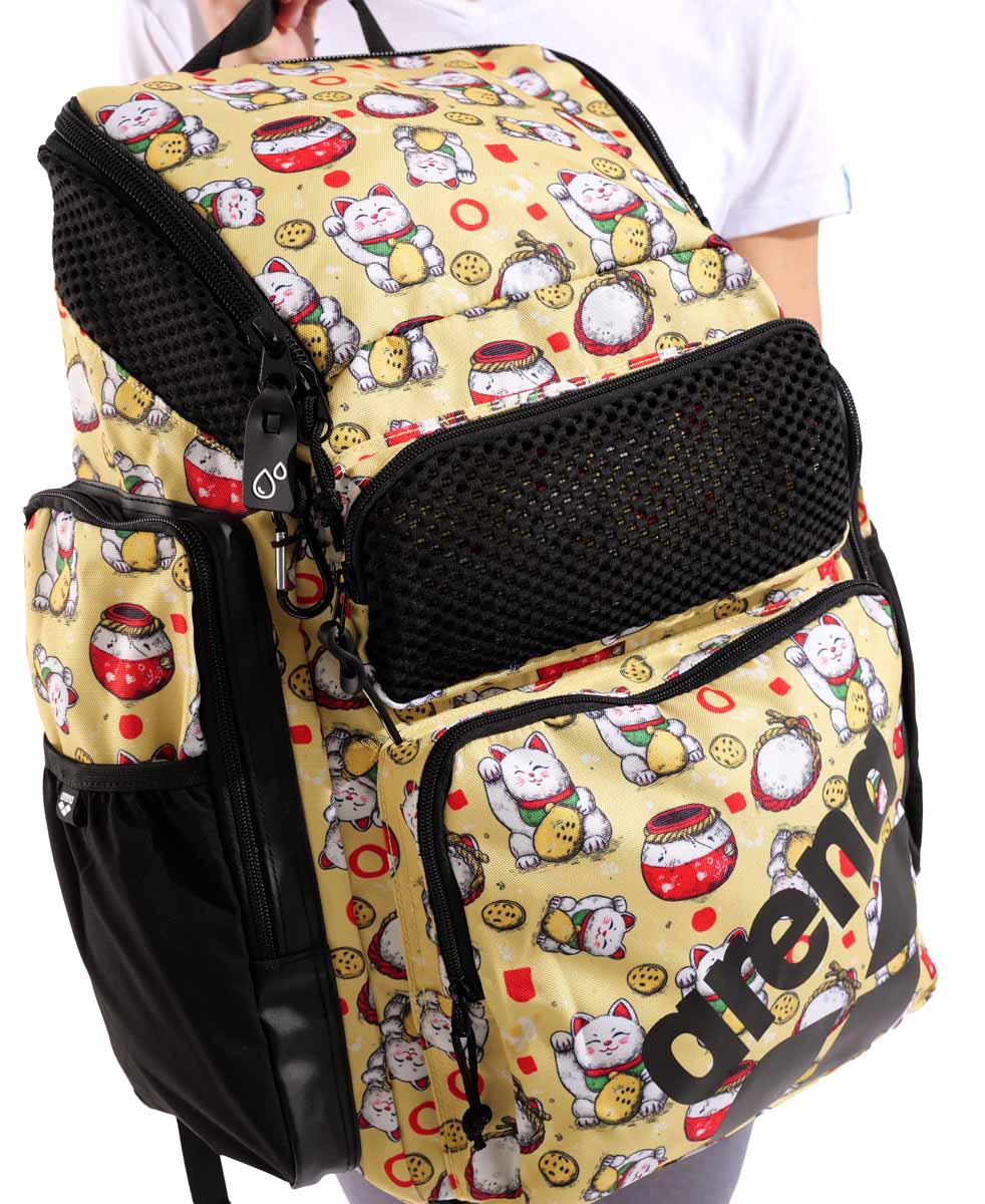 Arena One Go Allover Backpack 45L in Neko pattern, featuring multiple compartments and adjustable straps for travel and daily use.