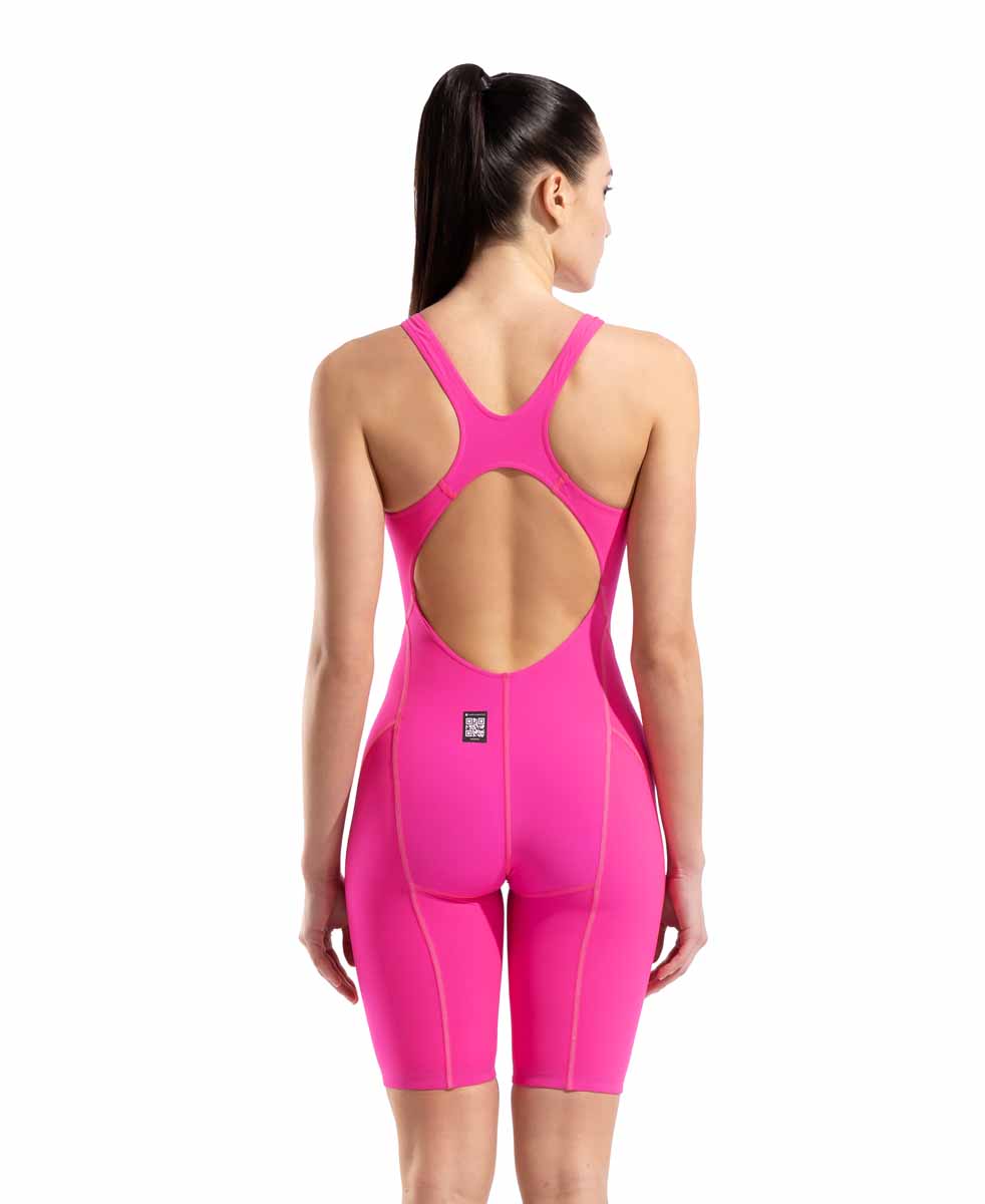 Arena Womens Powerskin Impulso openback kneesuit in shocking pink and water blue, featuring sleek design and open-back style.