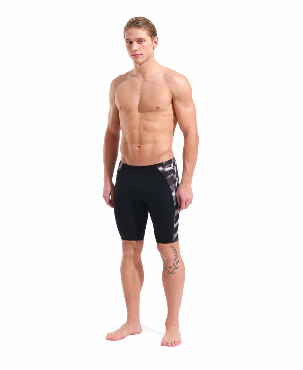 Black Arena men's Wave swim jammer with color-block design, made for competitive swimming and training.