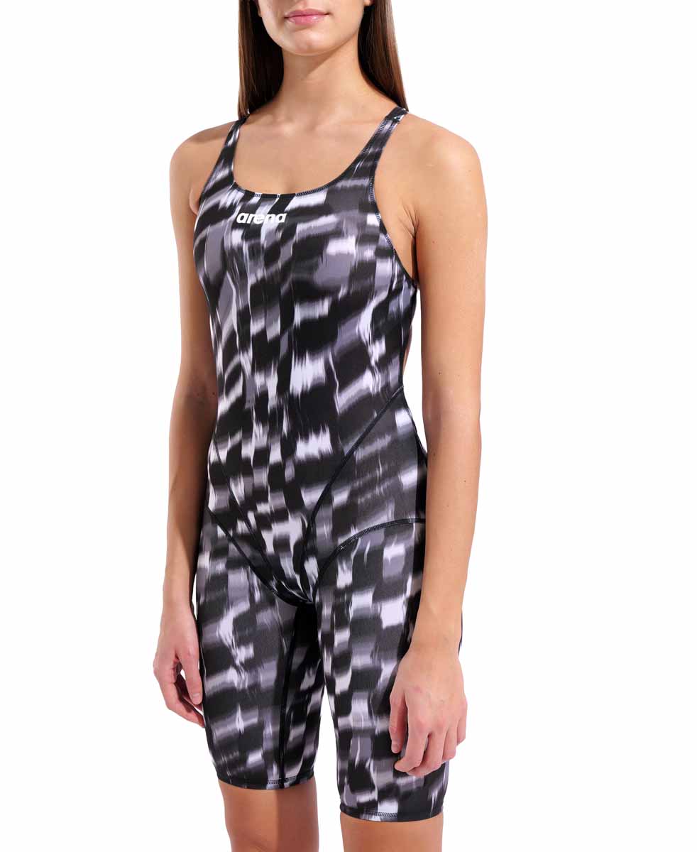 Arena women's Wave full body swimsuit kneesuit in black, featuring a sleek design and comfortable fit for swimming.