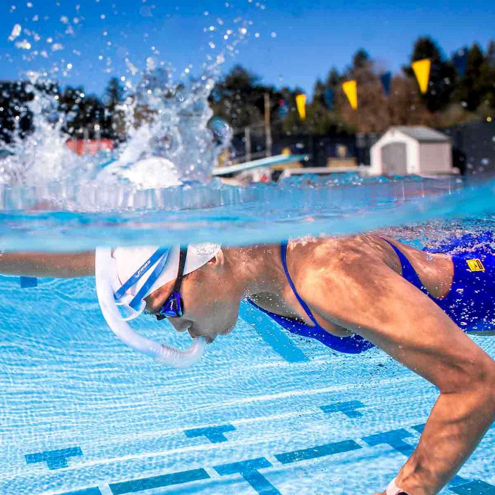 Finis Stability Snorkel in Glacier color, featuring a comfortable mouthpiece and adjustable head strap for snorkeling.