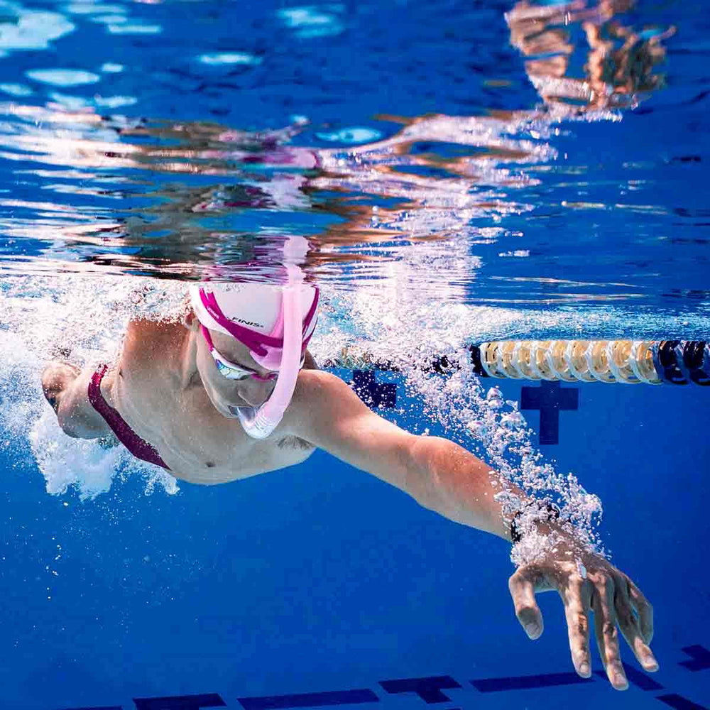 Finis Stability Snorkel in orchid color, adjustable snorkel for comfortable swimming, with mouthpiece and flexible tube.