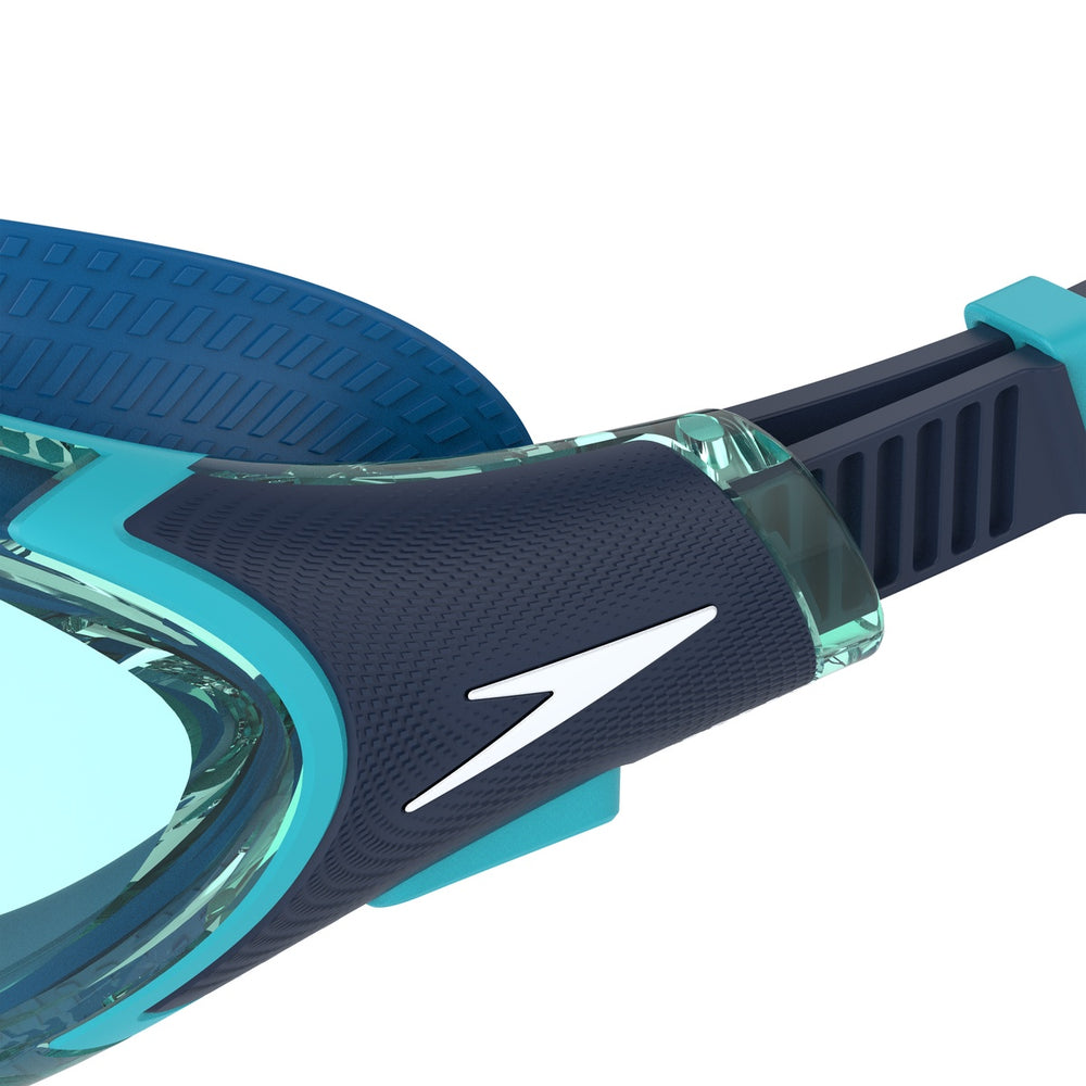 Speedo Biofuse 2.0 goggles in coastal teal and jade with adjustable straps and clear lenses for swimming comfort.